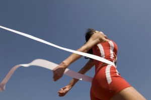 woman-crossing-finish-line